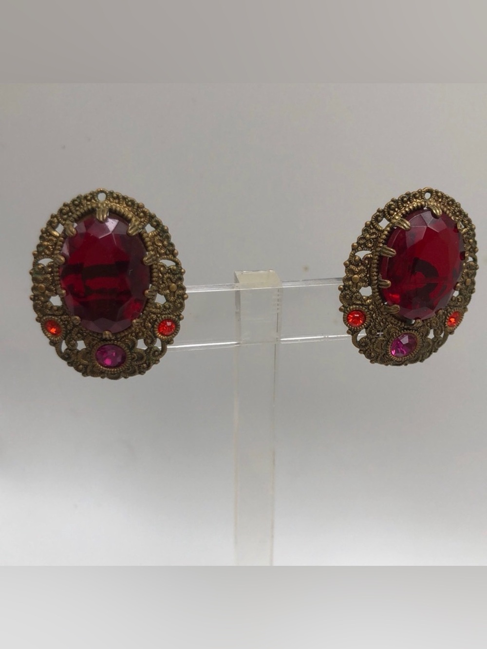 West Germany Ruby Red Sparkling Rhinestone Gold Filigree Clip Earrings Vintage